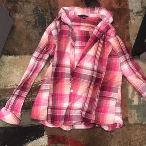 Woman’s pink flannel shirt